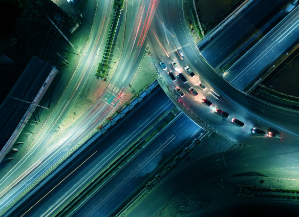 Expressway top view, Road traffic an important infrastructure, car traffic transportation above intersection road in city night stock photo