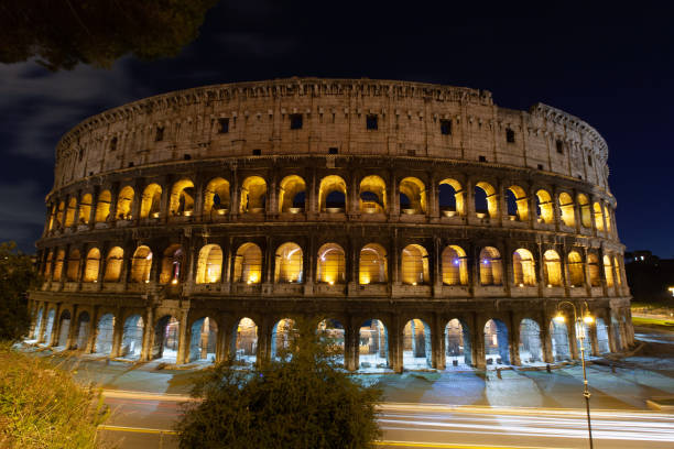 istock rome, italy, colosseum old ancient building gladiator battle at night. 1449142052