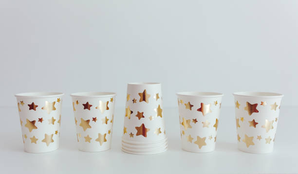 istock White paper disposable cup. Ecology concept. Paper dishware for party. White background. 1449142957