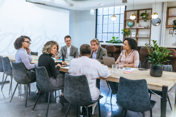 istock Coworkers Having a Meeting 1449144521