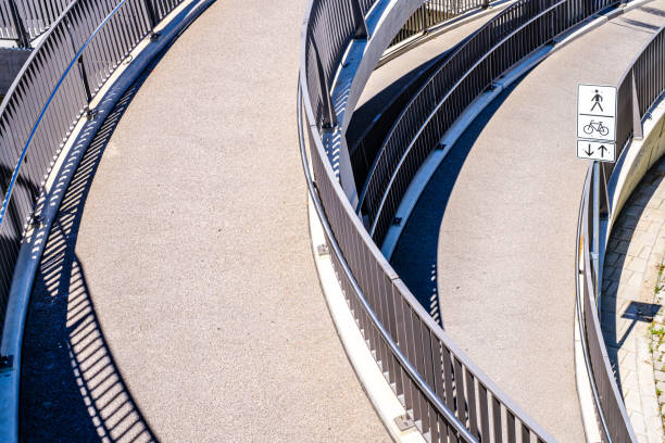 modern footbridge in austria stock photo