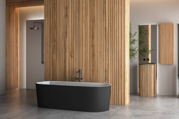 istock Modern bathroom interior with concrete floor, black white bathtub and double basin, shower, wooden wall, plant and city view from windows. Minimalist bathroom with modern furniture. 3D rendering 1449152014