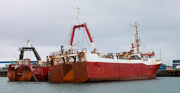 Industrial trawler ships are moored in port of Reykjavik, Iceland
