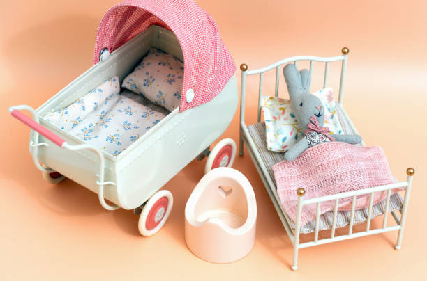 istock Little miniature bunny lies in bed. 1449159768