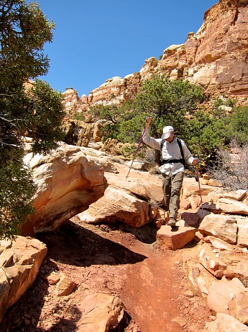 Hiking poles make all the difference along the Cassidy Arch Trail in Capitol Reef National Park, Utah.