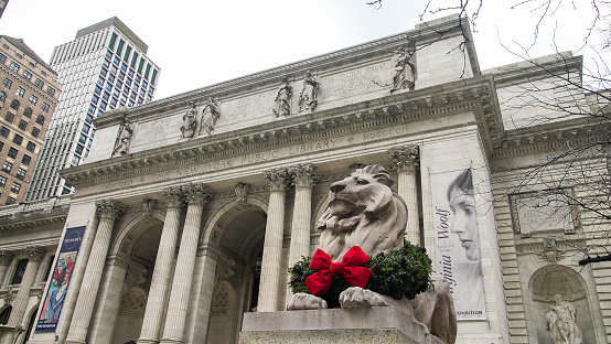 New York, NY, USA - December 10, 2022:  Christmas decoration at New York Public Library entrance