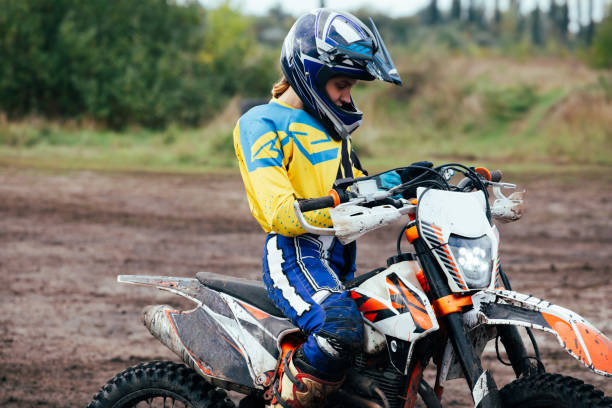 istock Young woman practice riding motorcycle 1449164147