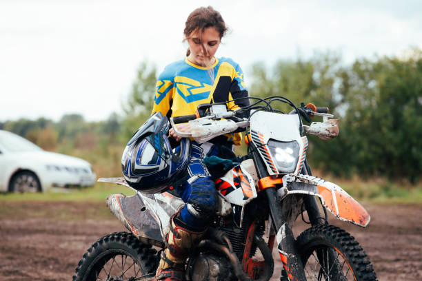 istock Young woman practice riding motorcycle 1449164212