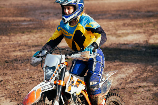 istock Young woman practice riding motorcycle 1449164231