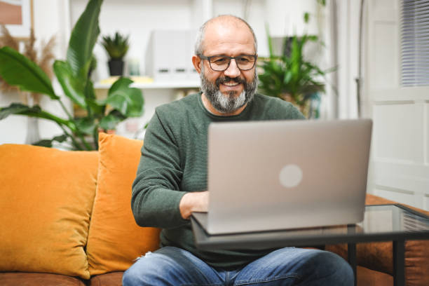 istock Mature man working from home 1449165469