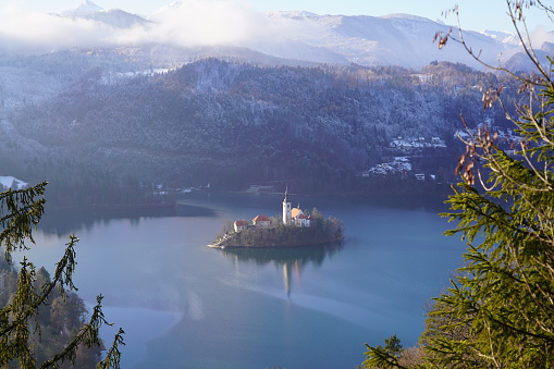 Famous tourist place with island on the middle of the lake and a castle on the cliff