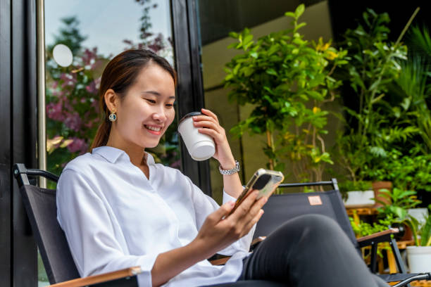 istock Woman relaxing in cafe 1449174122