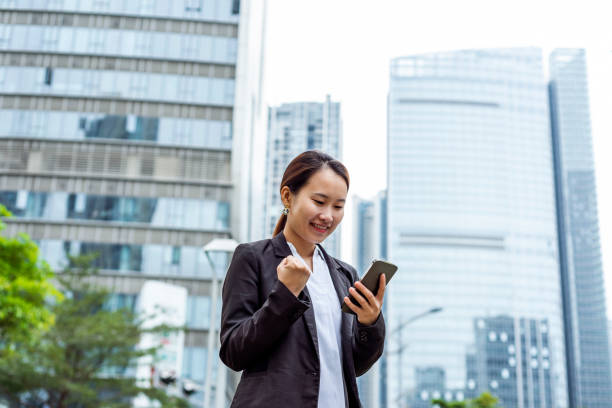istock Business woman using smartphone 1449174911