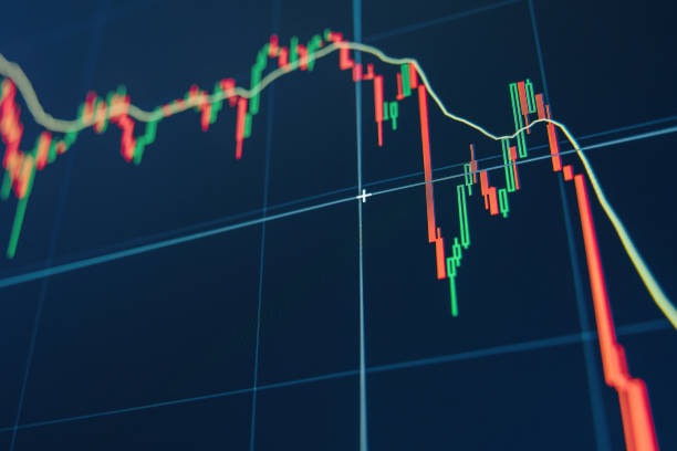istock Crypto diagram with green and red candlesticks on blue display. TradingView. 1449176479