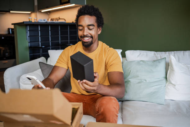 istock Man talking with his friend about his new purchase 1449178997
