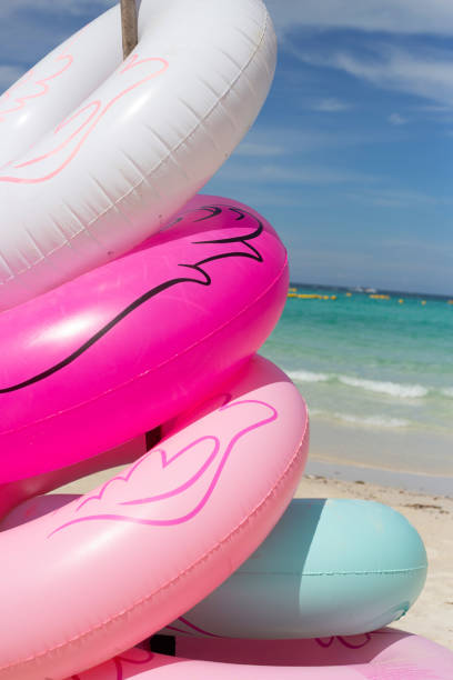 istock Inflatable rings on the beach. Summer concept 1449181791