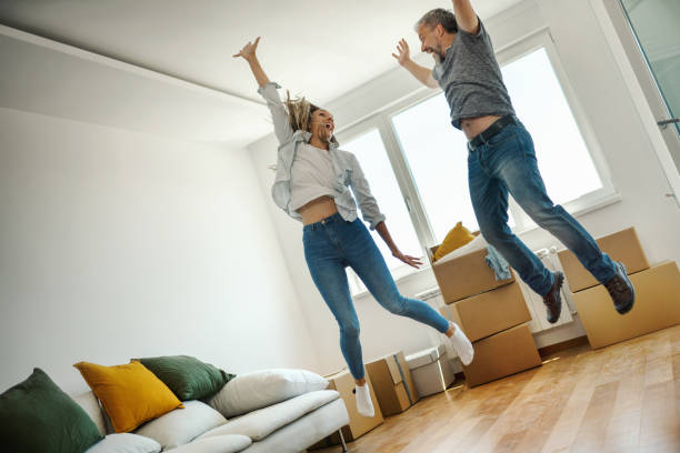 istock Young couple moving in together. 1449183140