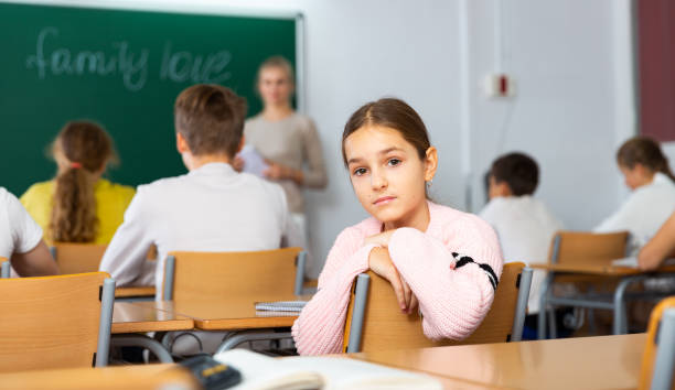 istock Girl feeling upset after getting bad mark at school 1449191521
