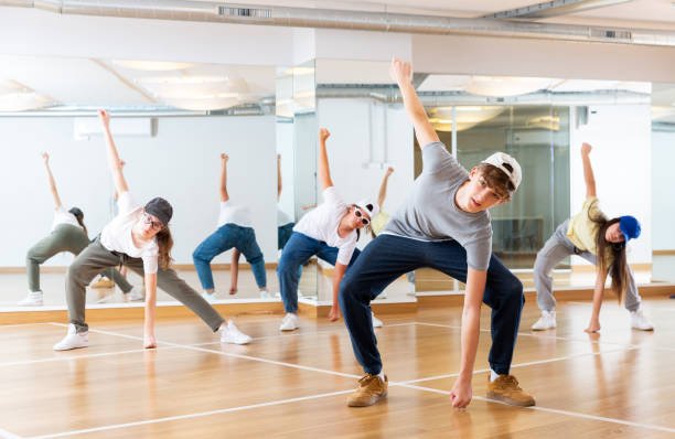 istock Teenagers training hip hop in dance studio 1449193161