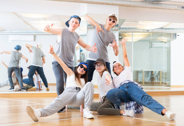 istock Teens hip hop dancers posing in studio 1449193242