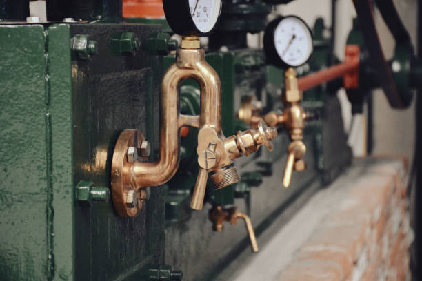 istock Old Industrial Machine pressure gauge and pipes 1449194883
