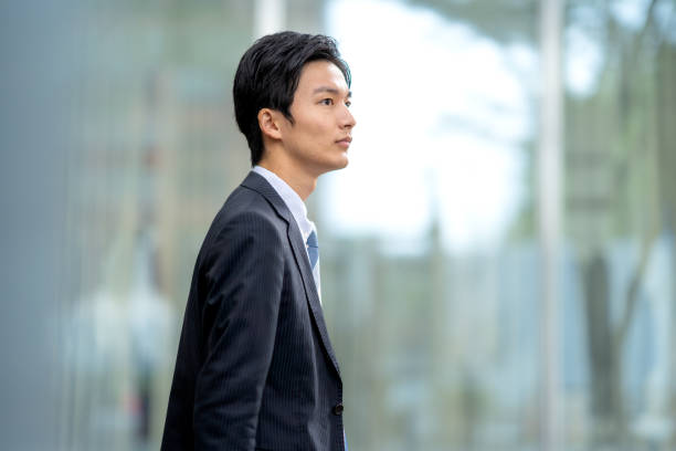 istock A man in a suit walking in the business district 1449204177