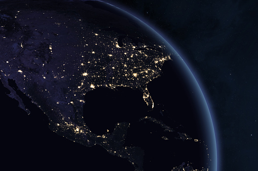 Planet Earth At Night. North and Central America at night viewed from space with city lights. View of United States from space. USA, Canada, Mexico, Cuba, Jamaica, Bahamas, Belize, Guatemala  and other countries. Elements of this image furnished by NASA. ______ Url(s): https://visibleearth.nasa.gov/images/144898/earth-at-night-black-marble-2016-color-maps/144945l