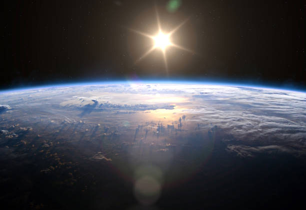 pianeta terra e sole.. - satellite view earth globe sunrise foto e immagini stock