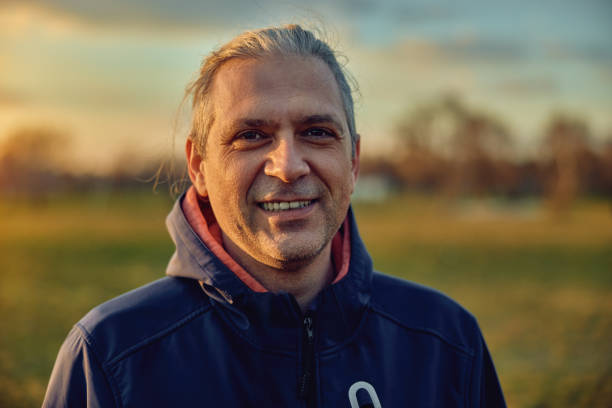 istock Portrait of a smiling man in a blue jacket 1449205867