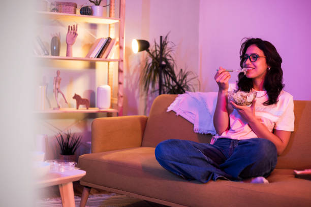 istock Young girl eats a healthy meal at home 1449207585