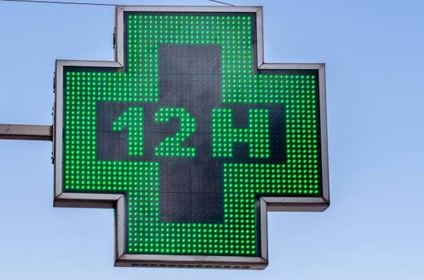 istock Green cross sign indicating  pharmacy 1449209503