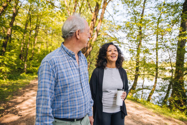 istock Retired Couple Taking a Walk in a Public Park 1449210930