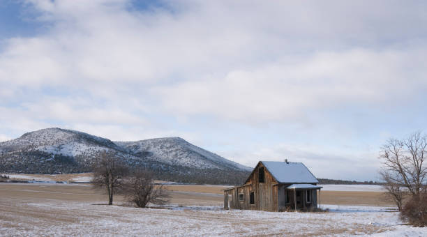 Broken down old wooden school building in Montana ranch country