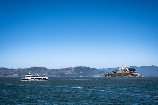 San Francisco, CA - May 31, 2022: Alcatraz City Cruises ferry returns from Alcatraz.