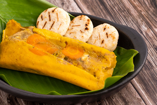 Colombian tamales recipe with steamed banana leaves - Traditional gastronomy of Colombia