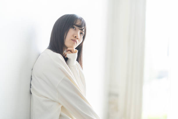 istock Asian female student is worried 1449228409