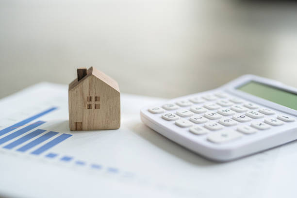 istock House toys and a white calculator 1449228760