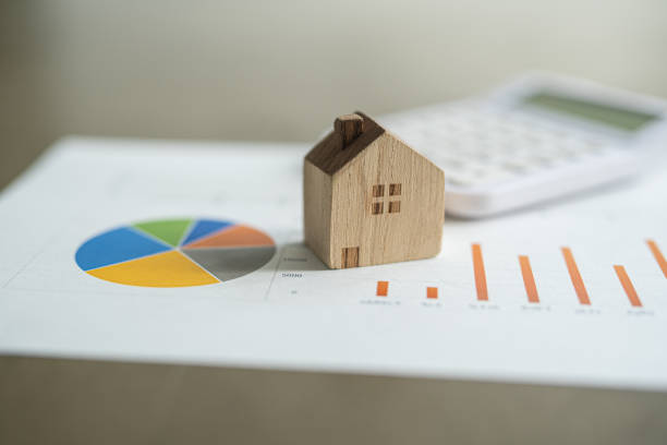 istock House toys and a white calculator 1449228765