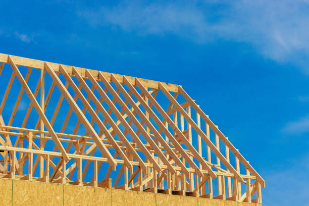 istock New unfinished residential construction home frame is being constructed. 1449239546