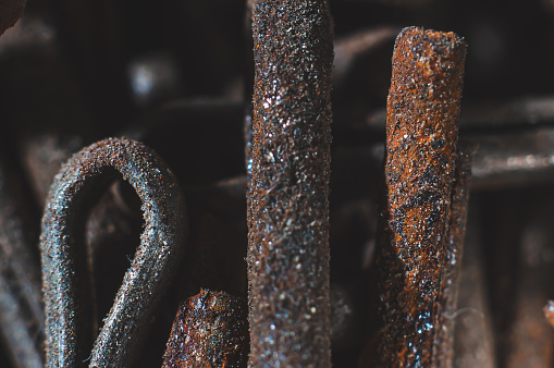Old rusted cotter pins for car repair close up, macro shot