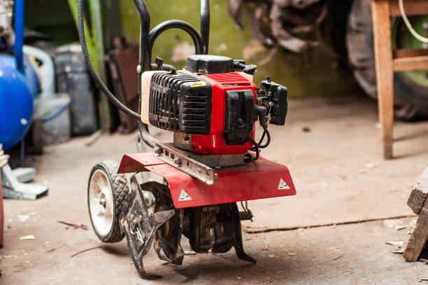 istock A small walk-behind tractor for plowing a garden is in the garage 1449248338