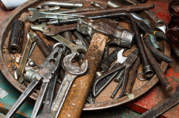 istock Tray with garage tools hammer open end wrenches and pliers 1449249805