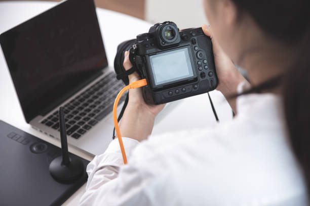 istock Female photographer 1449257827