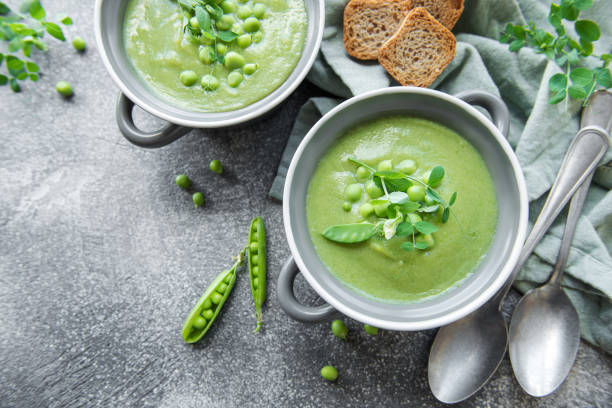 istock Fresh vegetable soup made of green peas 1449264499