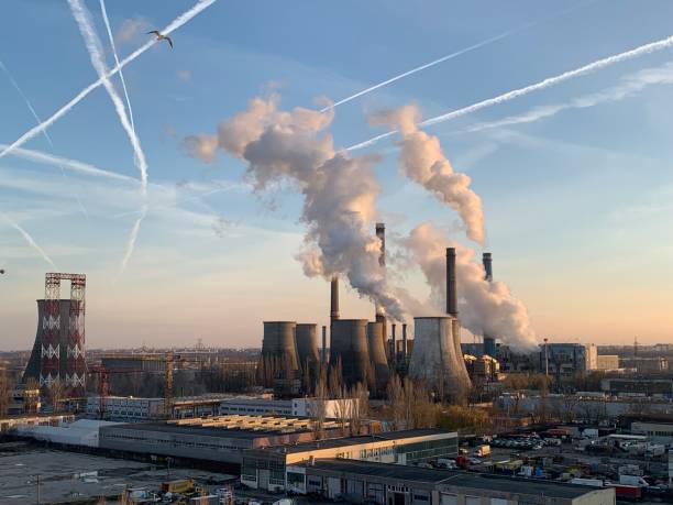istock Panorama of several power stations working at full capacity and polluting the air during winter, in the middle of Bucharest, Romania 1449265682
