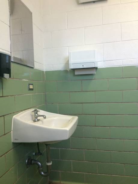 istock Public restroom in government green 1449266193