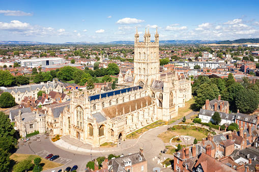 Aerial view of Gloucester Cathedral Church of St Peter and the Holy and Indivisible Trinity on a sunny day.