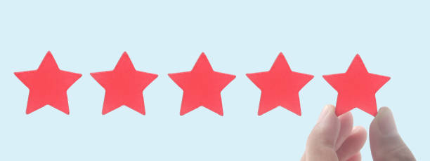 istock Rise on increasing five stars in human hand 1449267651