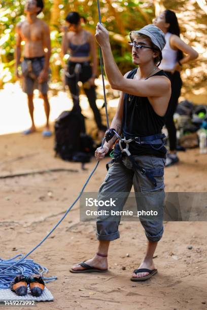 The Belayer Role In Rock Climbing Stock Photo - Download Image Now - Achievement, Active Lifestyle, Adults Only