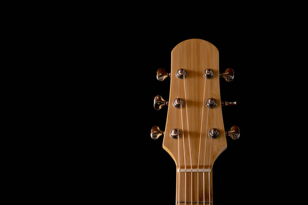 istock guitar headstock made from bamboo isolated on Black Background 1449274651